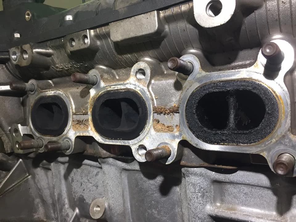 Engine intake manifold inspected during a UTB Auto service