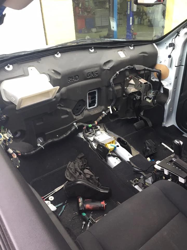 Vehicle interior trim removed for an electrical repair