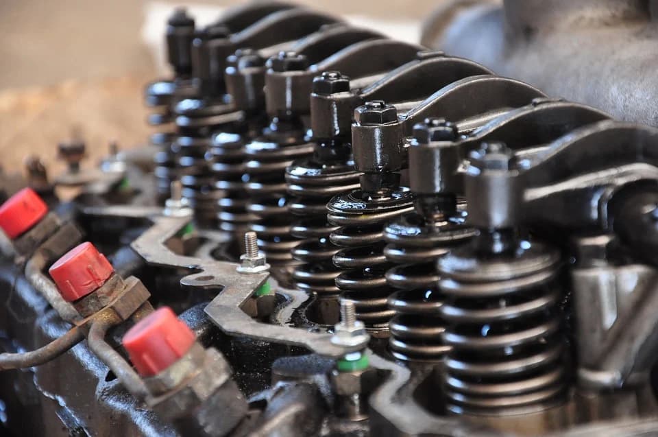Close up of engine valve springs during a top-end inspection